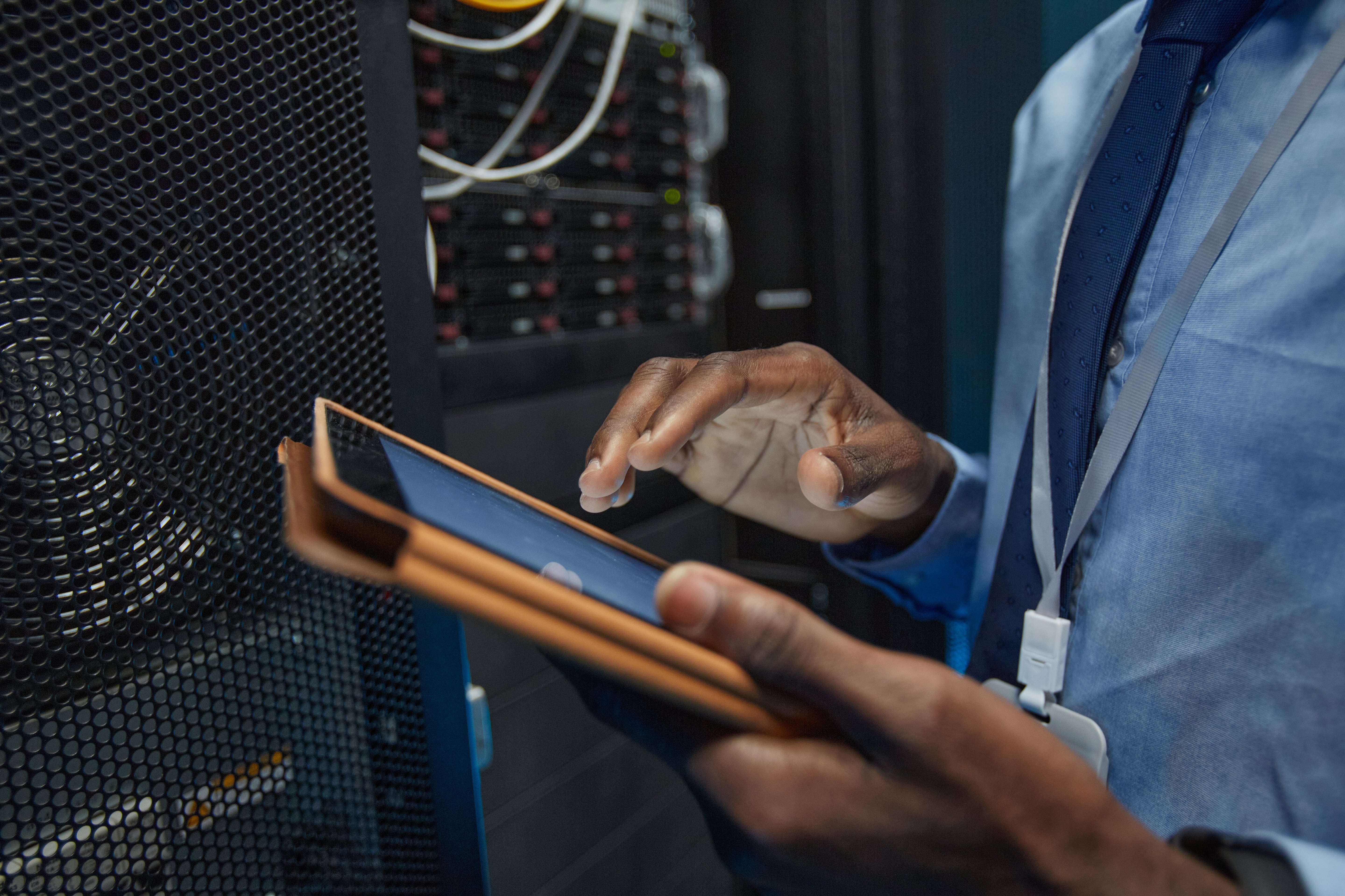 network-engineer-in-server-room-close-up-828NBSN