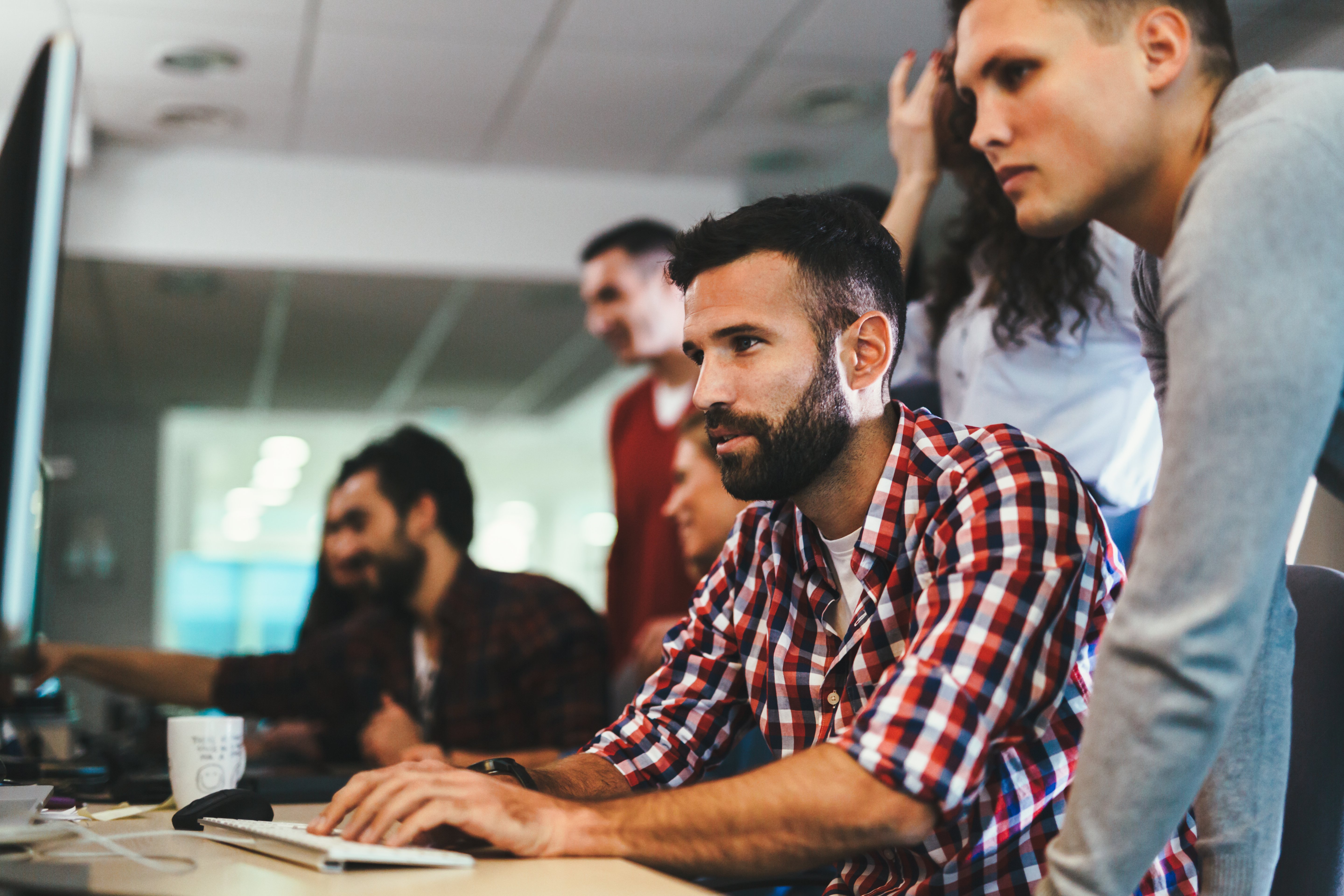 portrait-of-programmers-working-in-development-sof-3NEHQU8